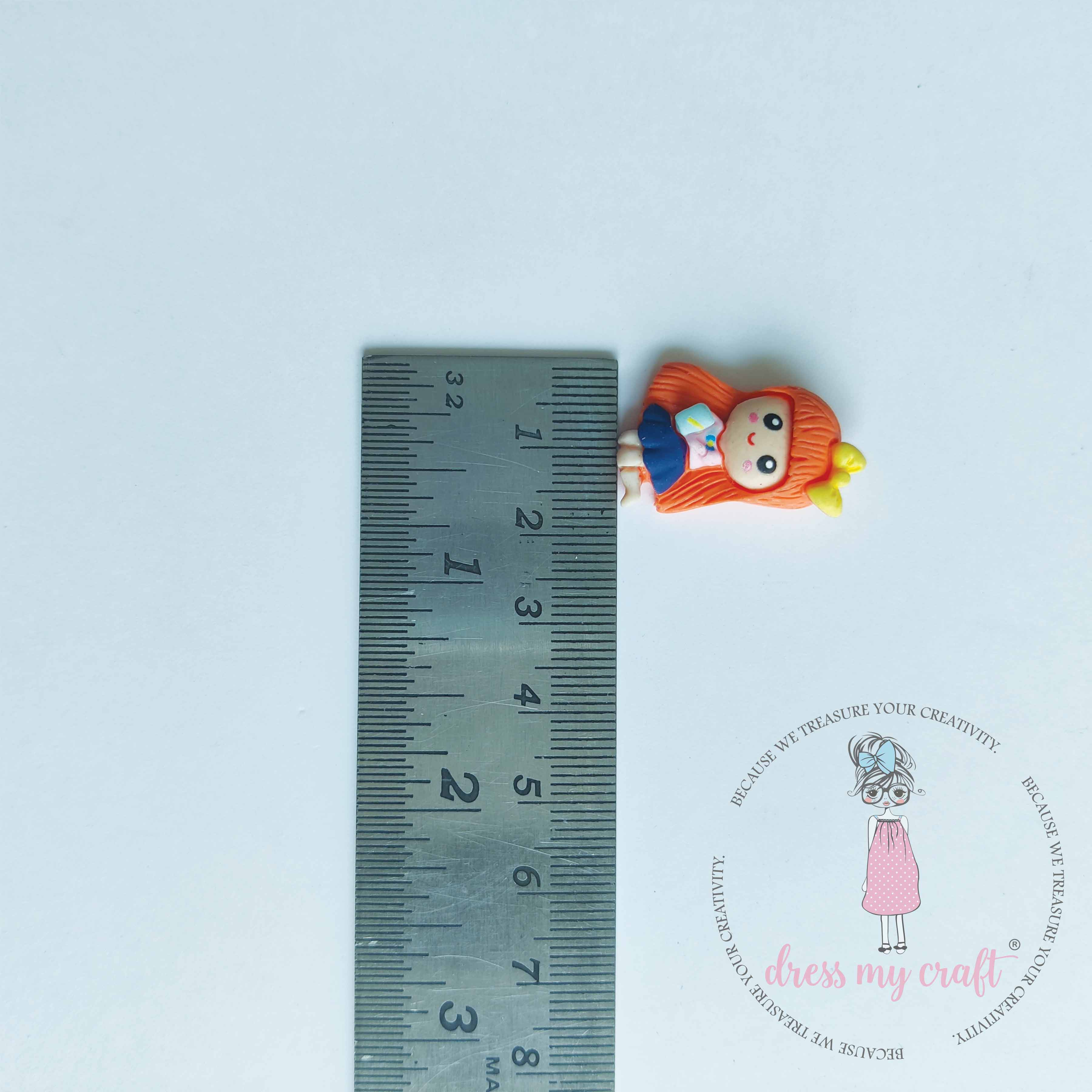 Miniature Figure Sitting Doll